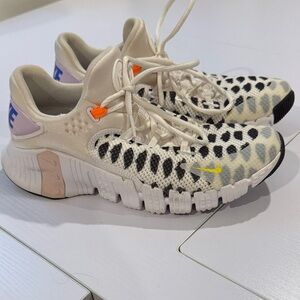 Nike Cream and Black Knit Sneakers with Orange Accents